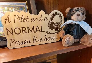 A Pilot and a Normal Person Live Here Sign